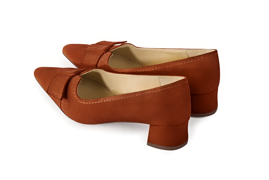 French elegance and refinement for these terracotta orange dress pumps, with a knot on the front, 
                available in many subtle leather and colour combinations. Possibility to customize with your colors and materials.
With its original cutout, this pretty fitted pump
will render you great services, combining comfort and distinction. 
                Matching clutches for parties, ceremonies and weddings.   
                You can customize these shoes to perfectly match your tastes or needs, and have a unique model.  
                Choice of leathers, colours, knots and heels. 
                Wide range of materials and shades carefully chosen.  
                Rich collection of flat, low, mid and high heels.  
                Small and large shoe sizes - Florence KOOIJMAN